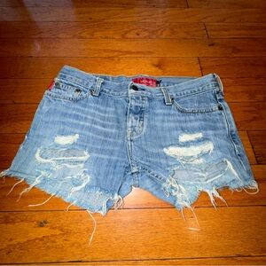 Medium washed distressed denim shorts
Hollister 
Size: 5 
Waist: 30in.
